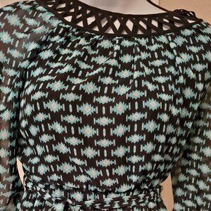 Seguin Heart Women medium 3/4 long sleeves 100% polyester.